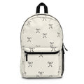 Minimal Bow Pattern Backpack — Cream Monogram Canvas School & Everyday Bag